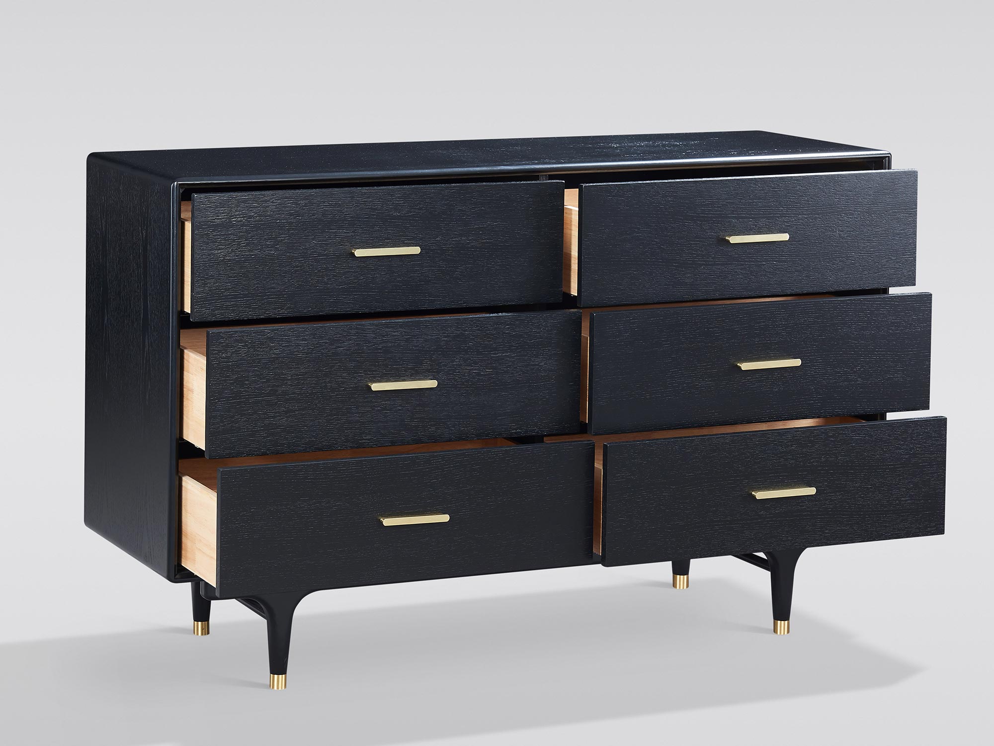 Nowoczesna czarna komoda ze złotymi uchwytami