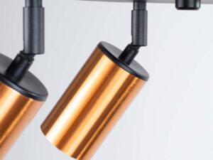Miniaturka 5 - Detal dwóch miedzianych reflektorów cylindrycznych plafonu czarno-miedzianego zbliżenie
