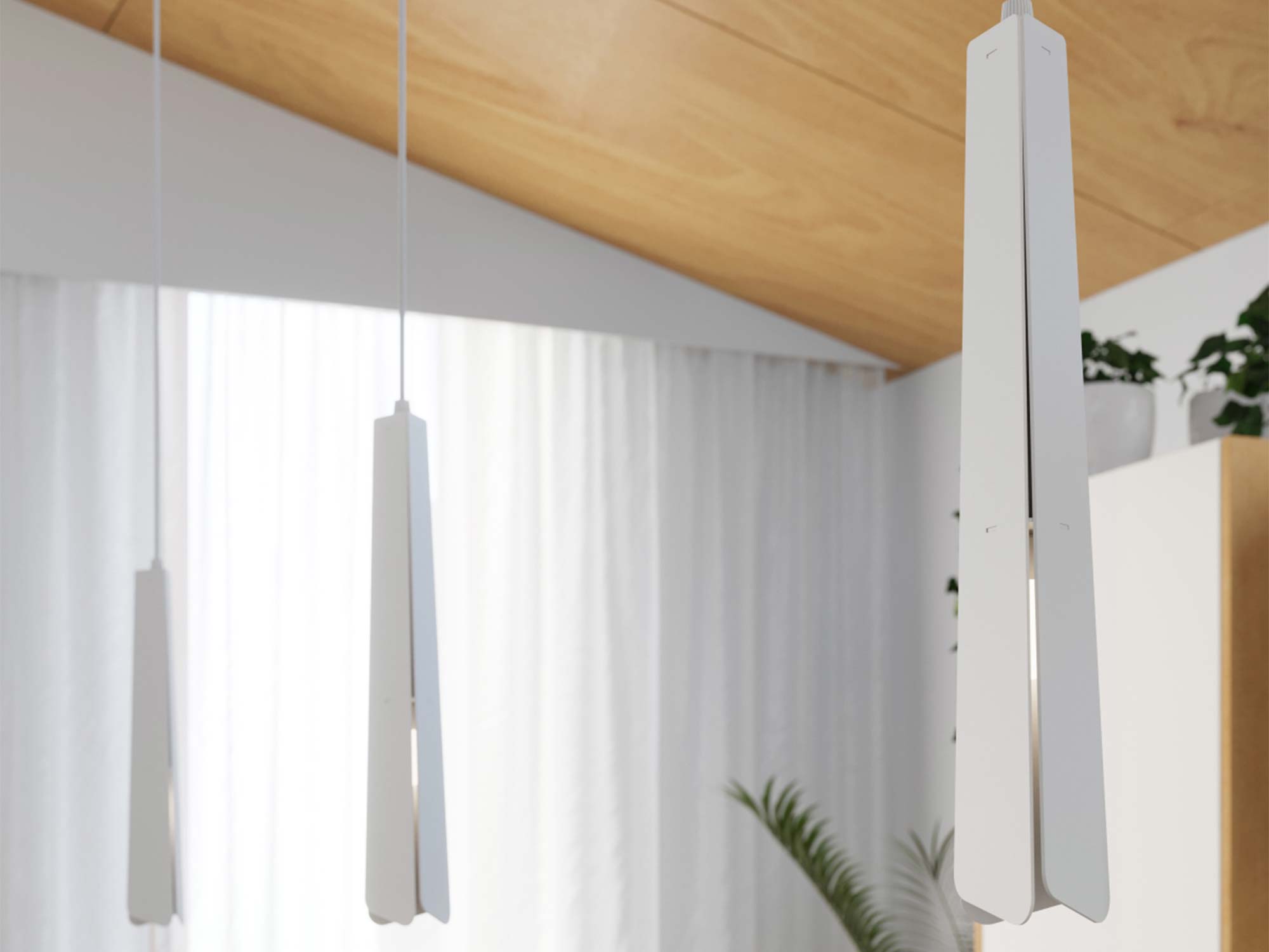 Trzy lampy wiszące białe minimalistyczne w aranżacji salonu zbliżenie