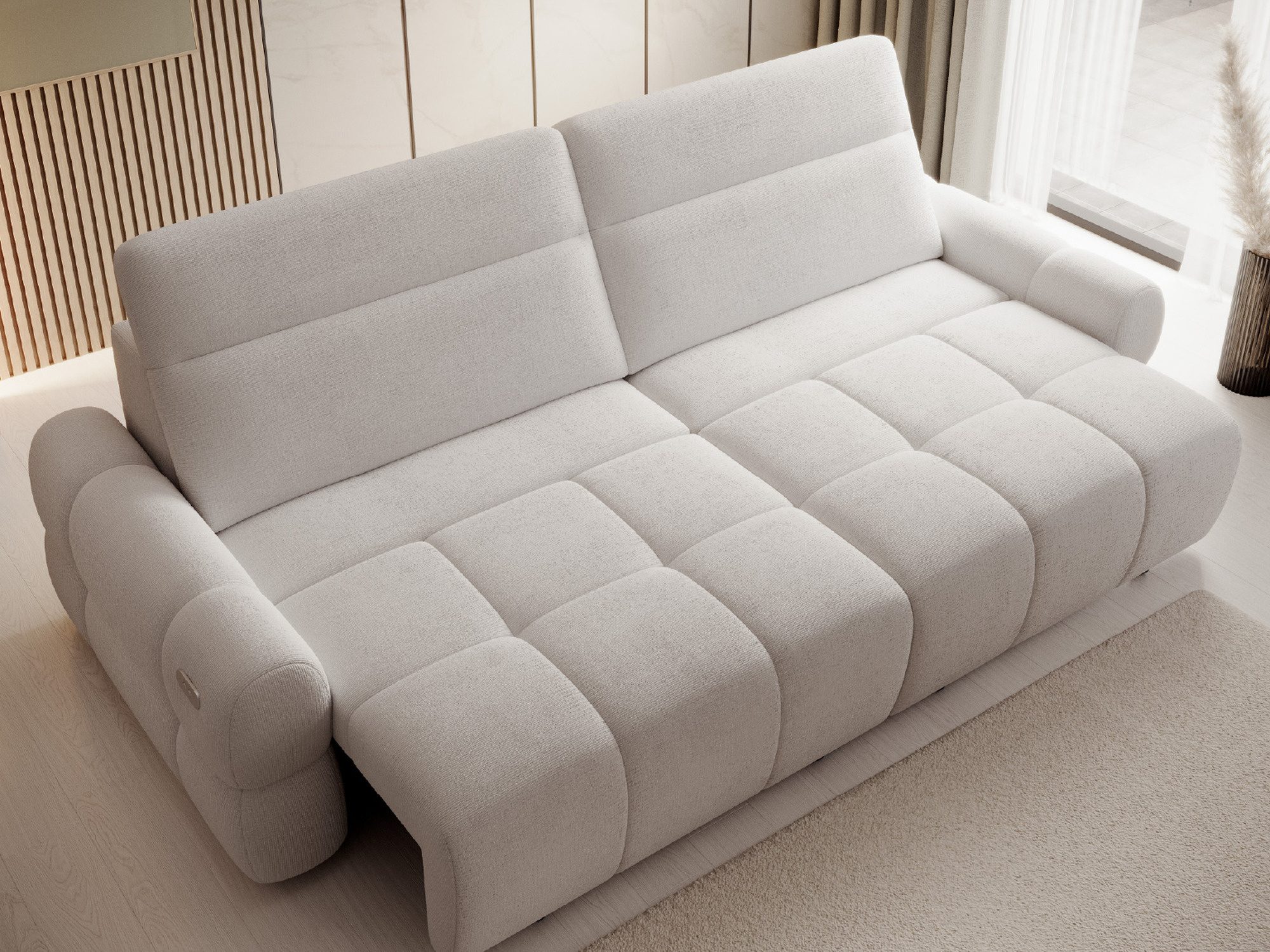 Sofa Marello mit ausgezogener Sitzfläche in hellem Wohnambiente