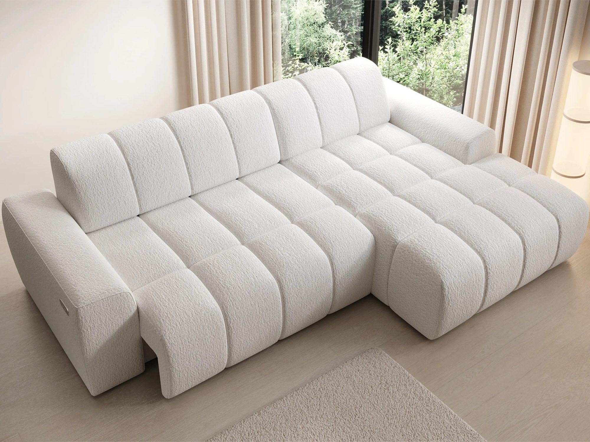Ecksofa Solviano mit ausgezogener Sitzfläche im hellen Wohnzimmer