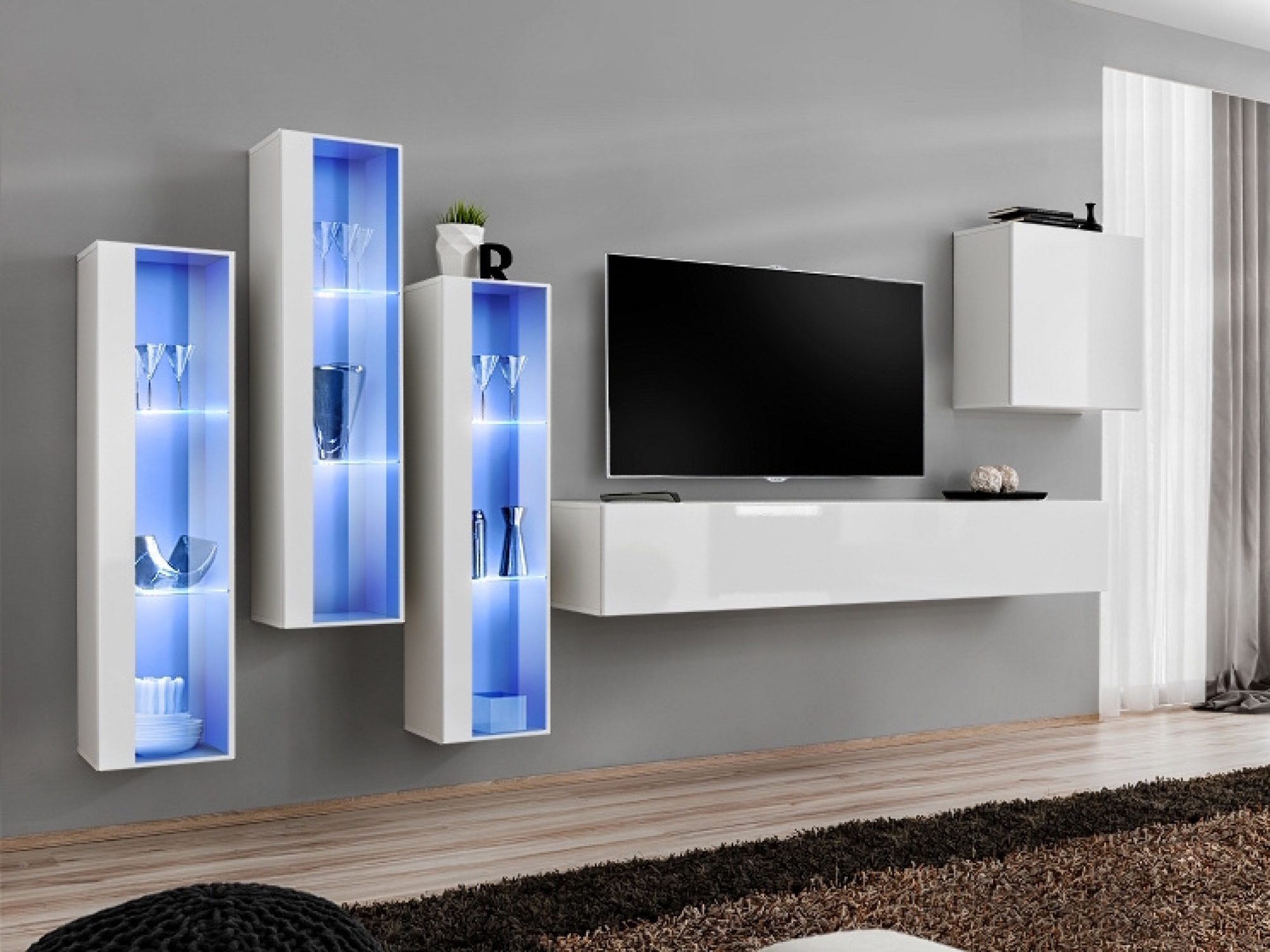 Wohnwand Kelmoro 330 cm mit 3 hohen LED-Vitrinen im Wohnzimmer