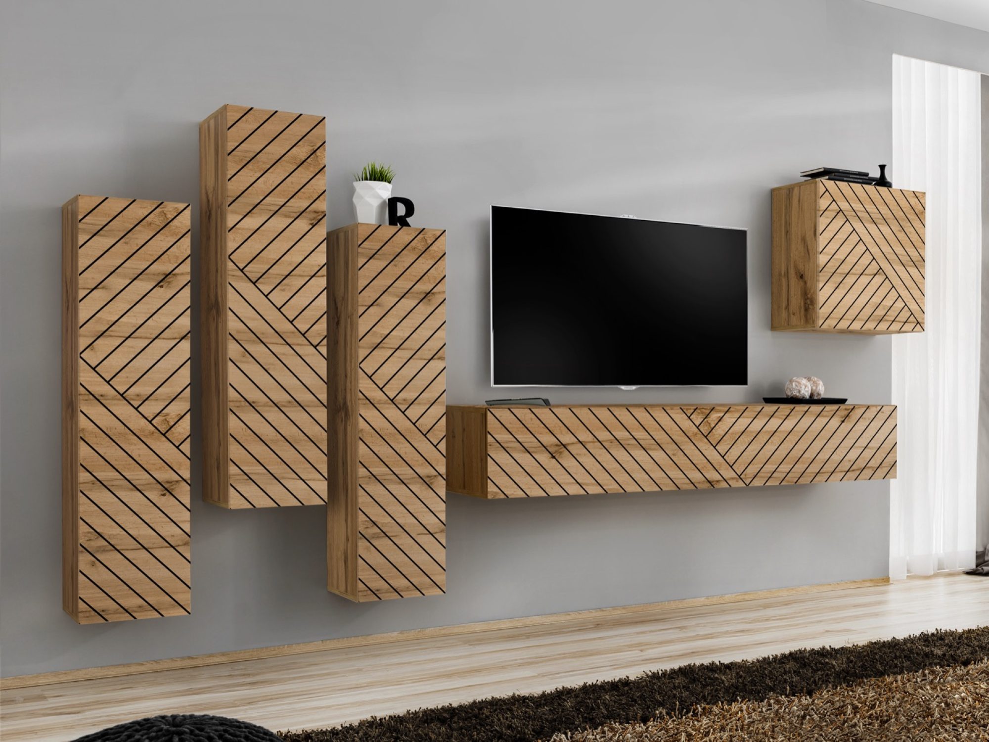 Obývací stěna Kelmoro 330 cm s drážkovanými čely a 3 vysokými skříňkami v interiéru obývacího pokoje