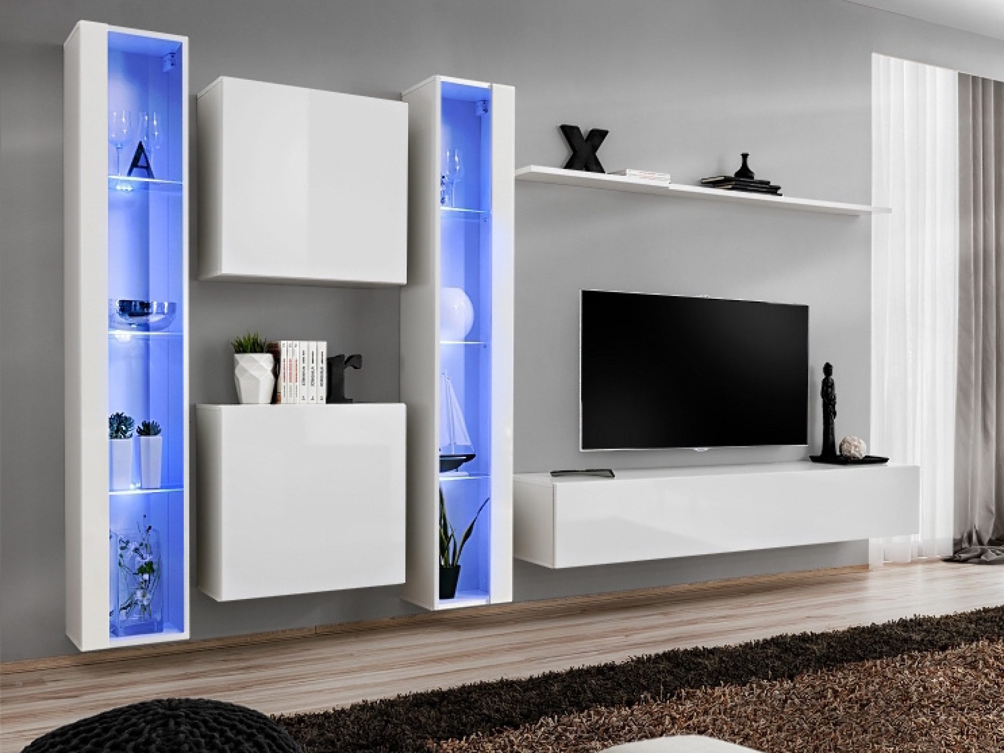 Wohnwand Kelmoro 330 cm mit hohen LED-Vitrinen und Schränken im Wohnzimmer