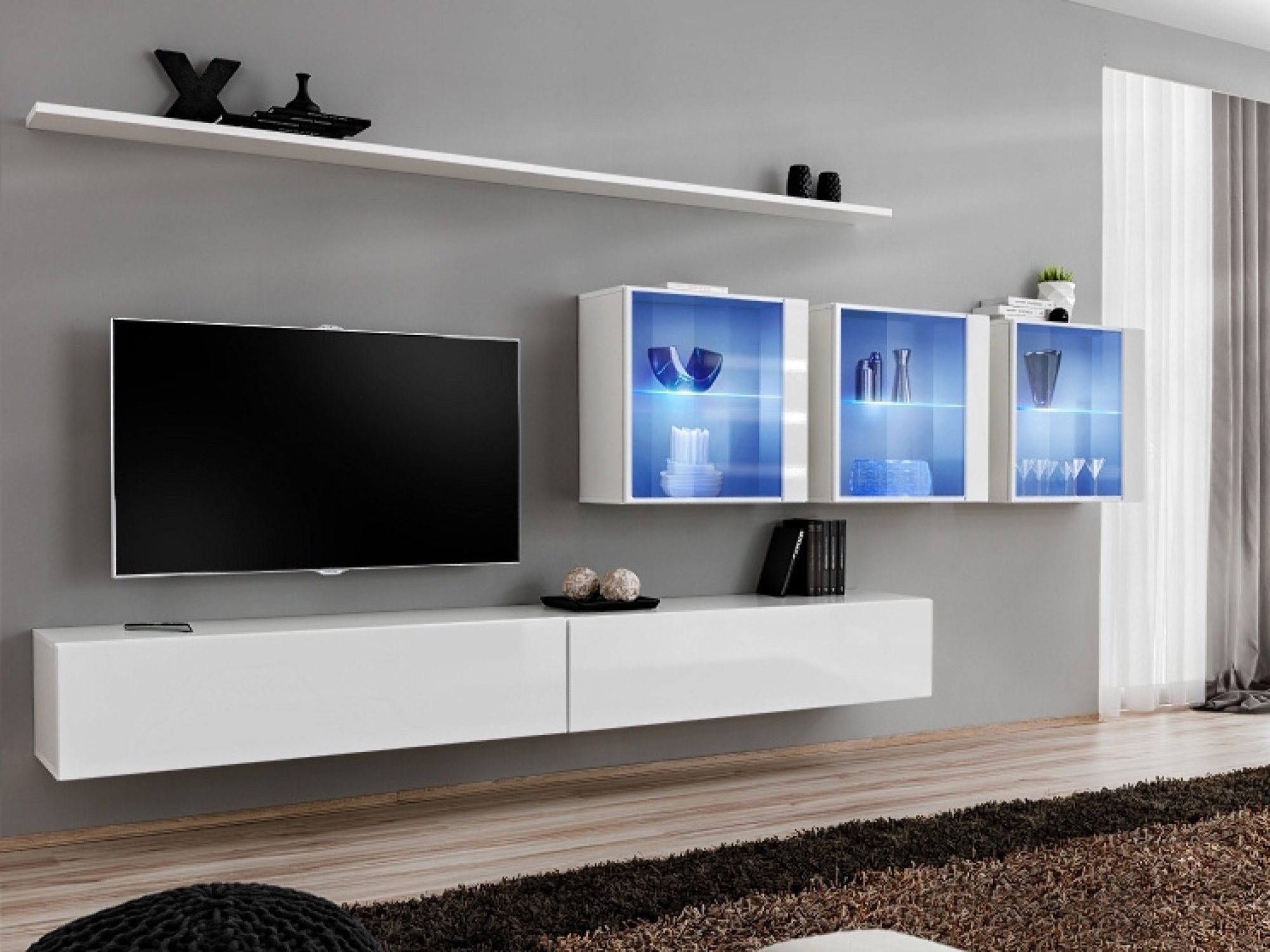 Obývací stěna Kelmoro 340 cm se 3 LED vitrínami a 2 TV stolky v interiéru obývacího pokoje
