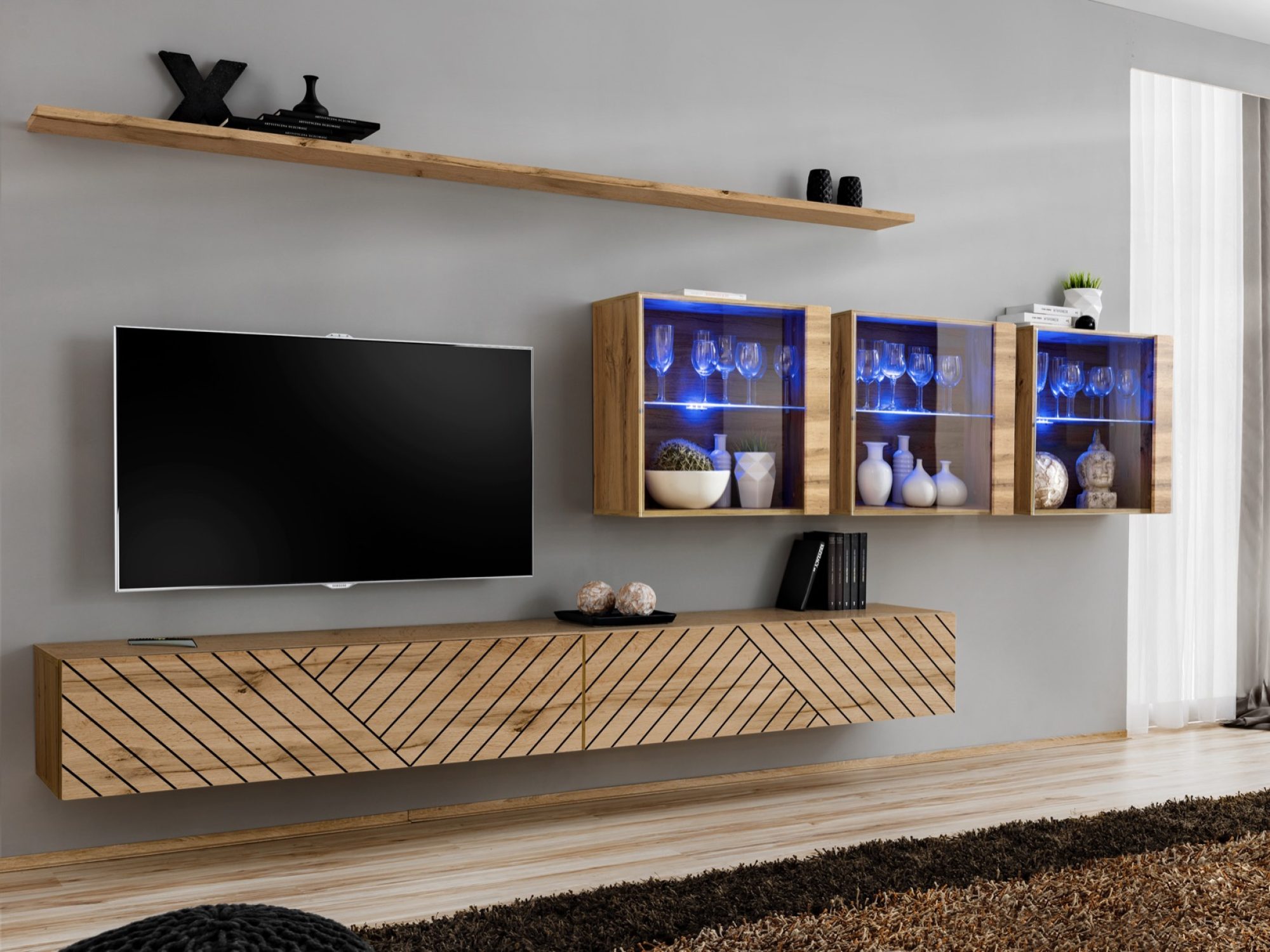 Wohnwand Kelmoro 340 cm mit geriffelten Fronten, 3 Vitrinen und 2 TV-Lowboards im Wohnzimmer