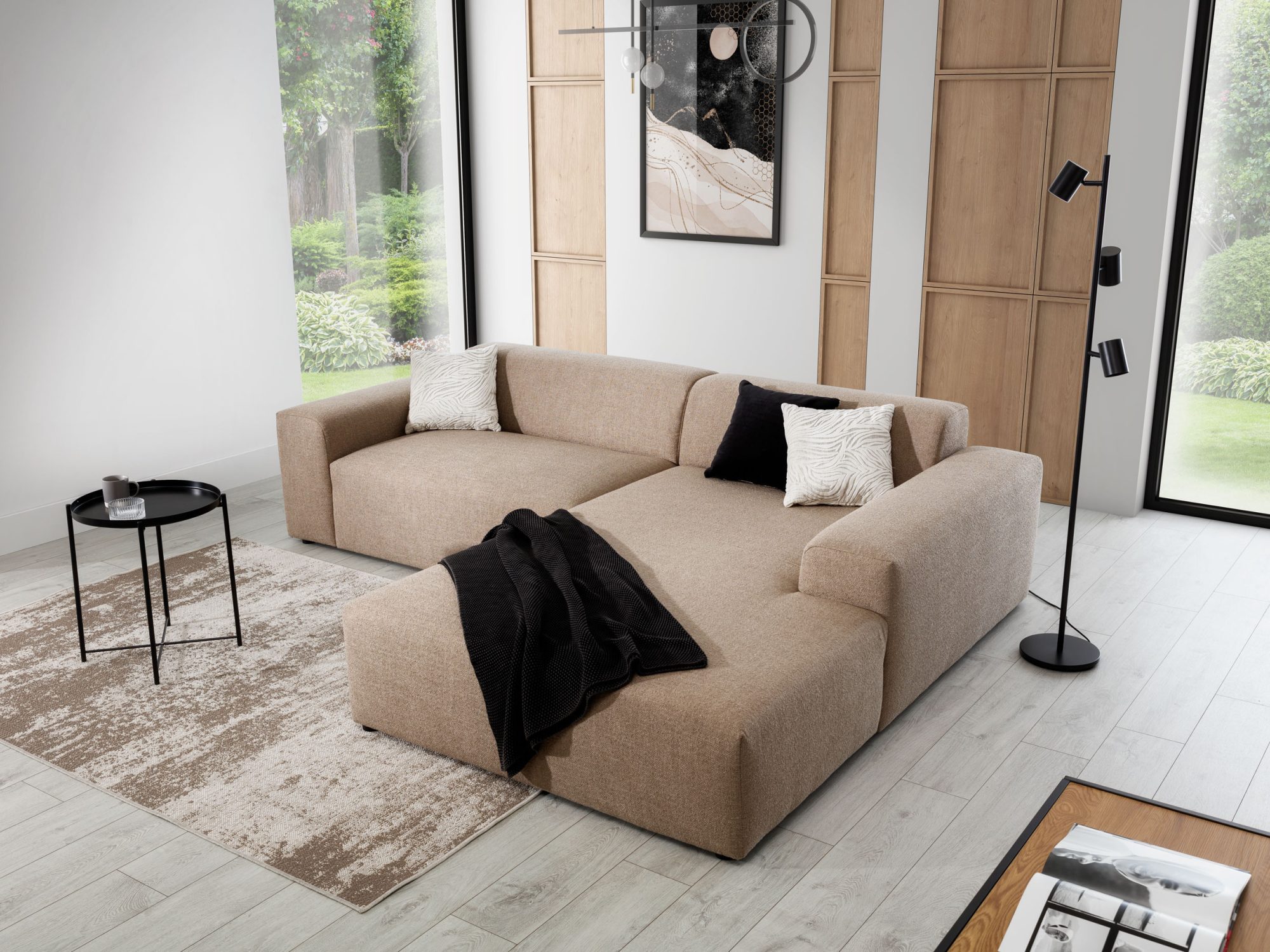 Ecksofa Astrevia mit großer XL-Ottomane im Wohnzimmer