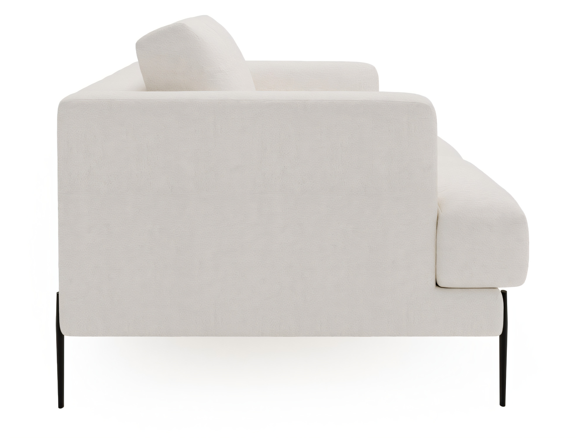 Seitenansicht des Sofas Delvora mit Armlehne und tiefer Sitzfläche