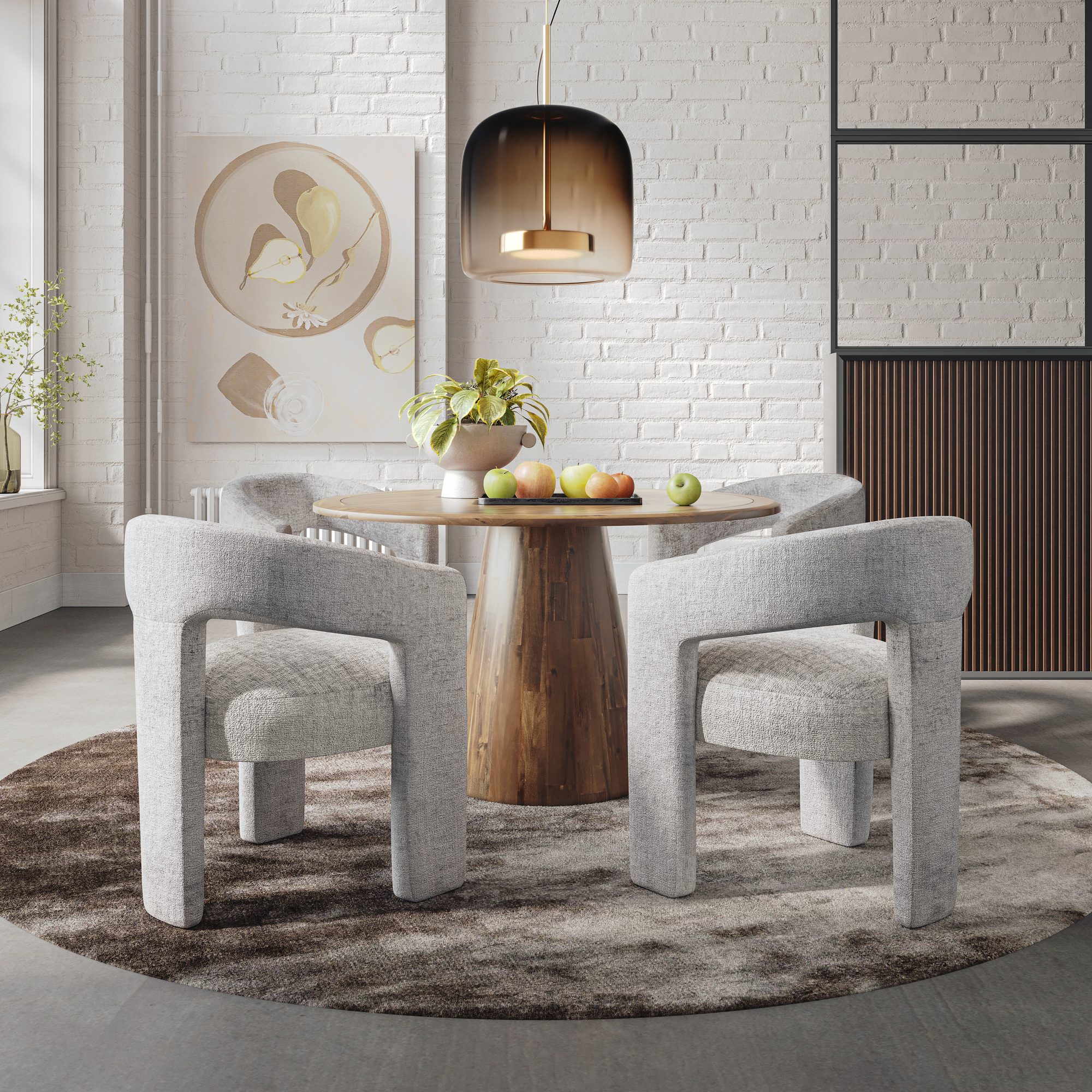Essgruppe Avola mit rundem Tisch und vier grauen Stühlen im Interieur